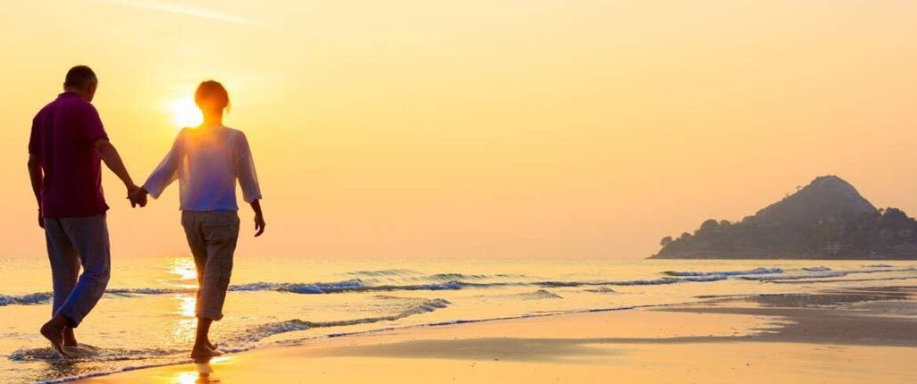 Couple walking on the beach