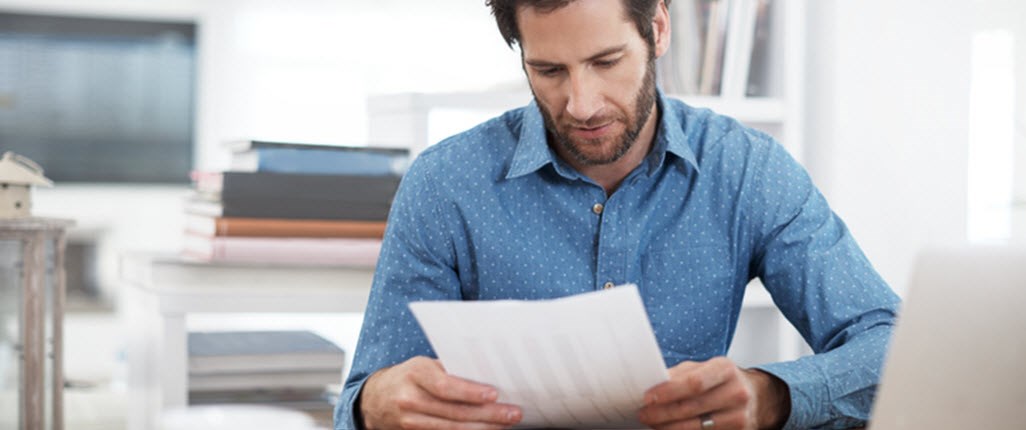 Man looking at the documents